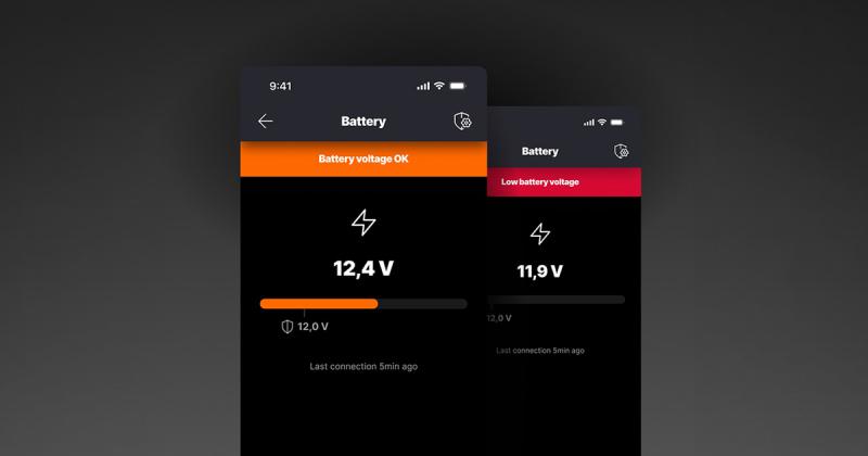 Two phone screens, one showing a normal battery voltage and the other showing a low battery voltage. The background is dark gray.